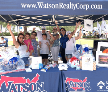 excited group under tent